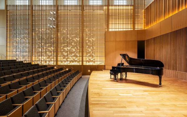 Contemporary recital hall with grand piano onstage